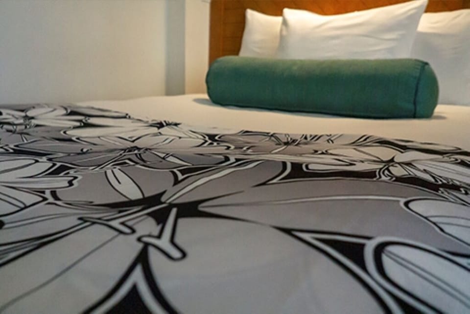 Sink into smooth bedding details that feel fresh and crisp.