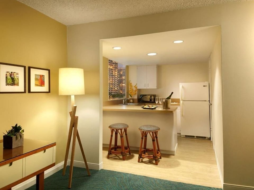 Sip morning coffee at the breakfast bar with handy kitchenette.