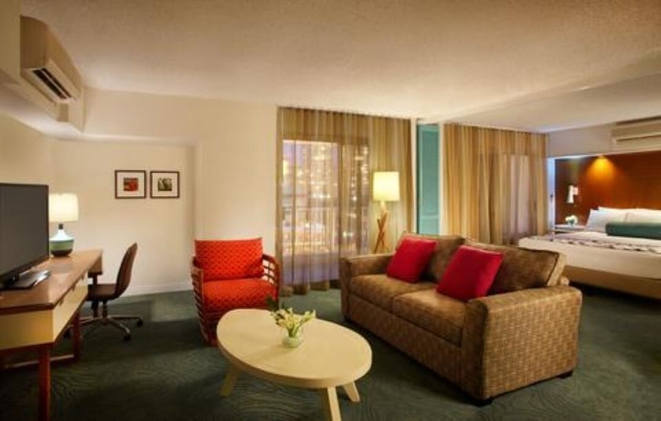 Relax in the inviting lounge with cozy seating and soft lighting.