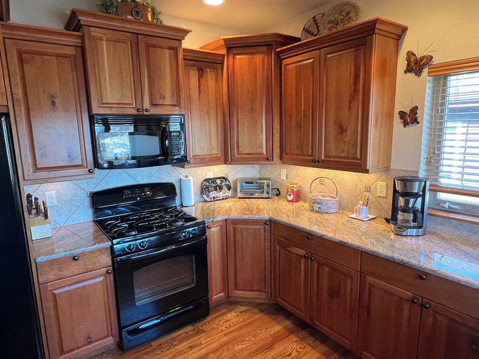 Well stocked kitchen with gas stove
