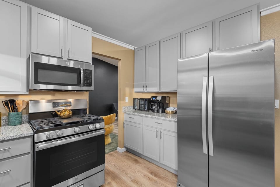 Kitchen full equipped with modern appliances