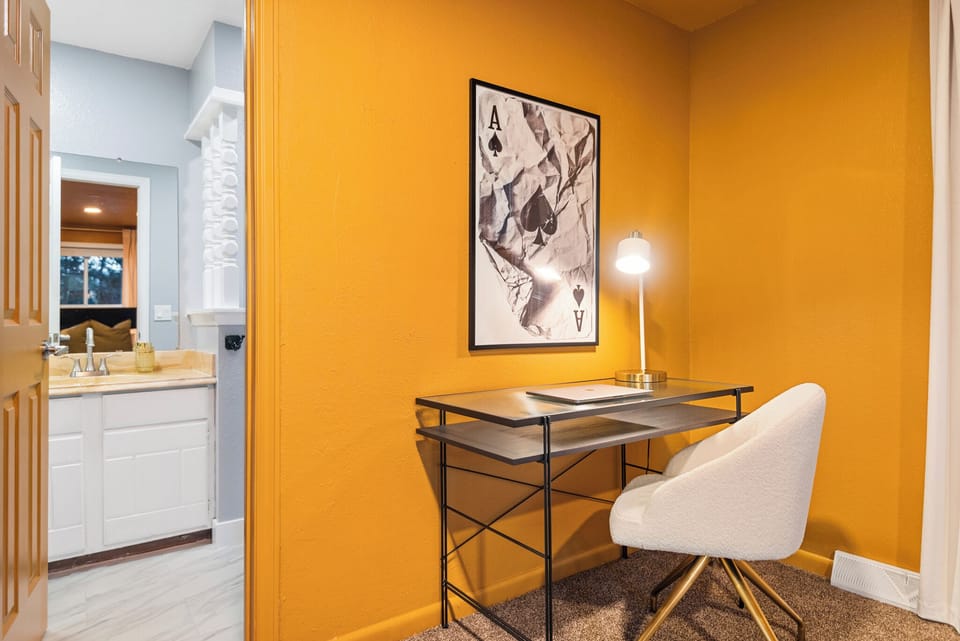 Dedicated workspace and  en suite bathroom in bedroom 1