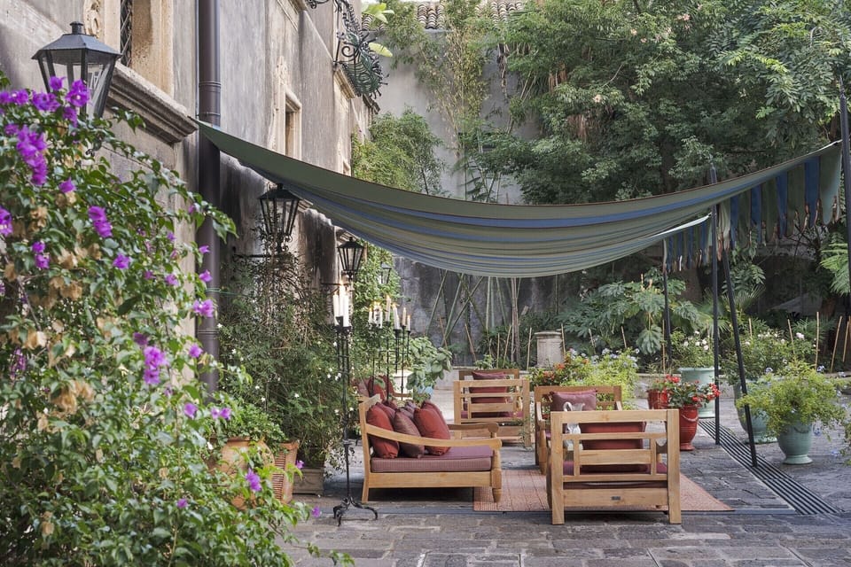 The shady sitting area outside the ground-floor bedrooms.