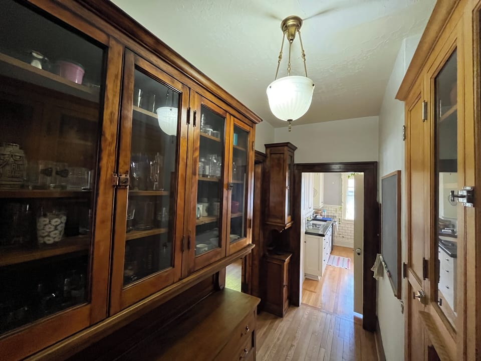 Beautiful built-in cupboards in the butler's pantry