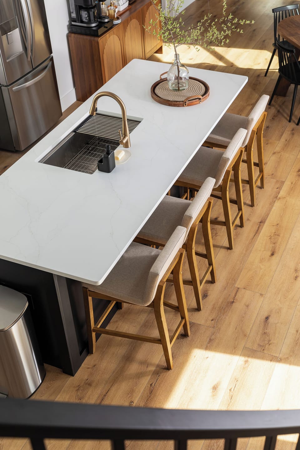 Modern kitchen with quartz island seating, perfect for gathering