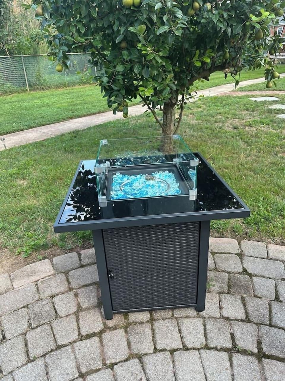 Propane fire pit-  grab the chairs off shed deck or the beach rug from outdoor storage bin and hang by the fire