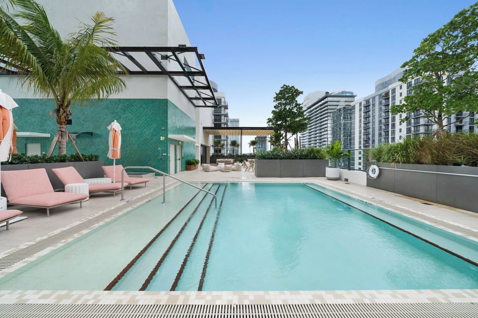 Dive into luxury. Our rooftop pool offers the ultimate sanctuary for afternoon lounging