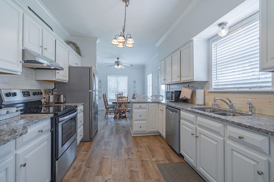 Farmhouse kitchen - stocked with dishes, utensils, and basic cookware