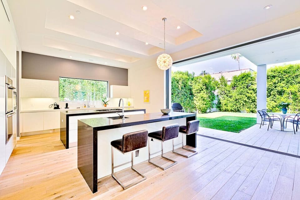 Sleek, modern kitchen with spacious countertops, fully equipped for daily cooking or entertaining