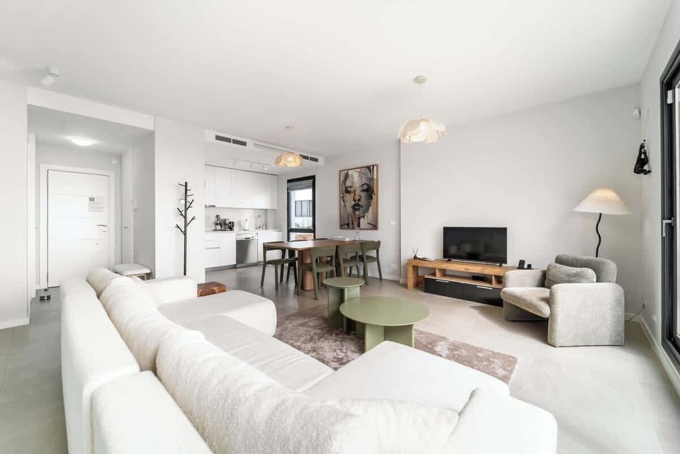 Spacious living room designed for relaxing, watching TV, or spending time with family and friends.