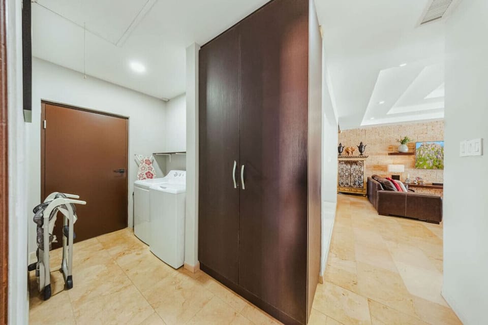 Convenient laundry and storage space designed to make longer stays effortless