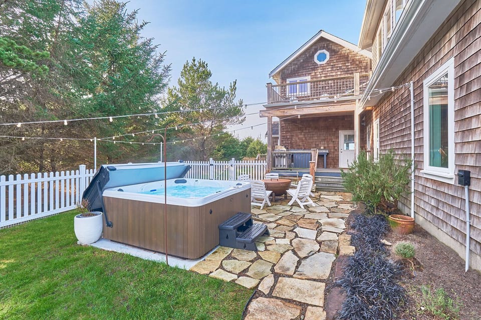 Kick back and relax in the hot tub and enjoy a toasty fire