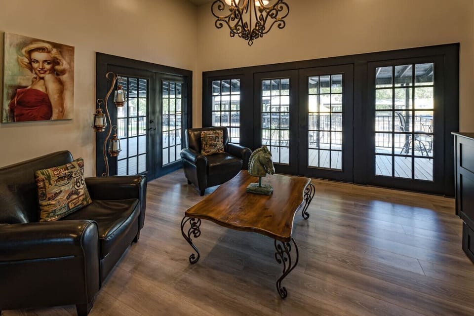 The Beltz House sitting room includes a queen Murphy bed, providing a flexible space for both relaxation and additional sleeping accommodations.