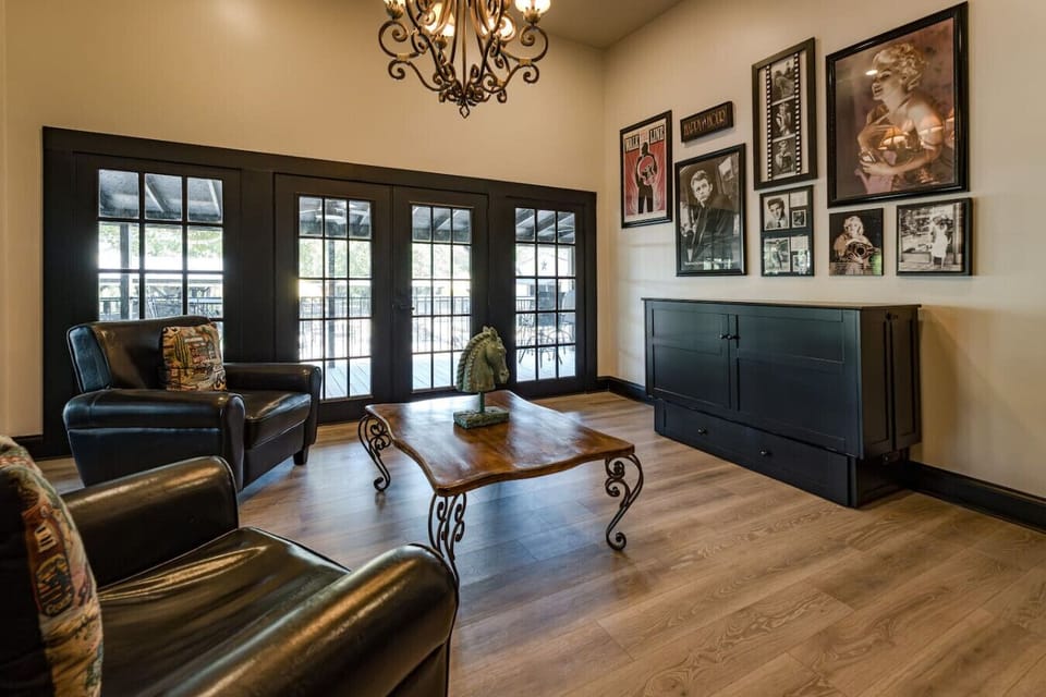 The Beltz House sitting room includes a queen Murphy bed, providing a flexible space for both relaxation and additional sleeping accommodations.