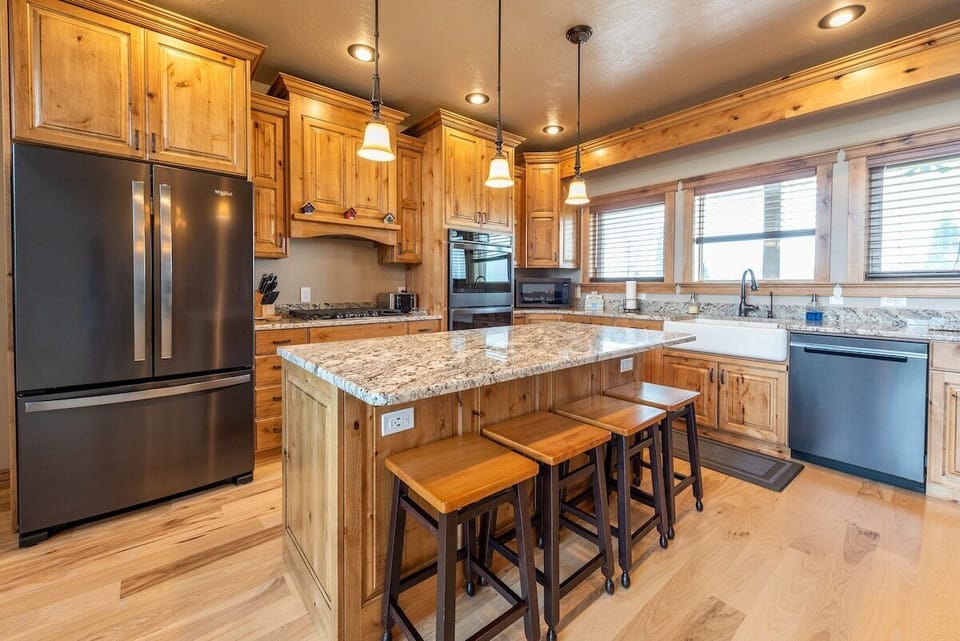 Enjoy a home-cooked meal in the dining area, with seating for 12+ guests.