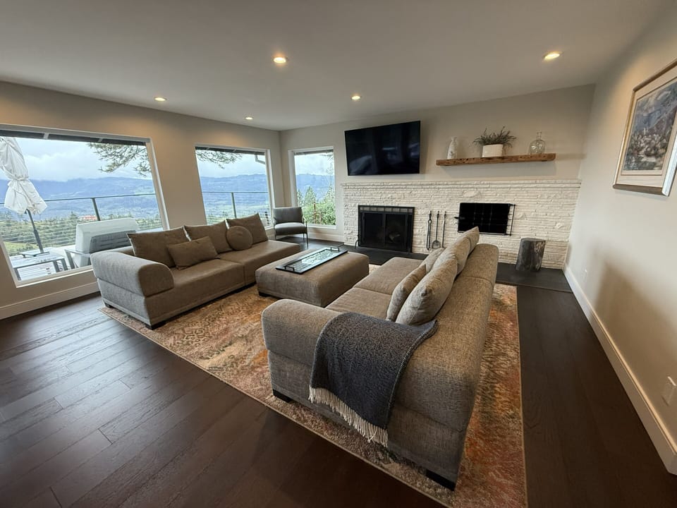 Living room with stunning views of napa valley and it's world renowned vineyards