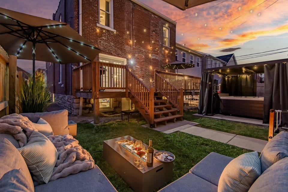 Private Terrace & Yard: Host a magical night out with a lit umbrella, fire table, and multiple lounging zones designed for maximum relaxation under the stars.