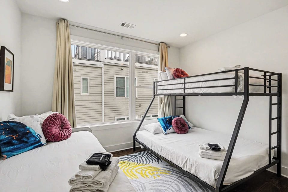 Bonus room w/ twin-over-queen bunk bed and a twin daybed w/ twin trundle | Unit A