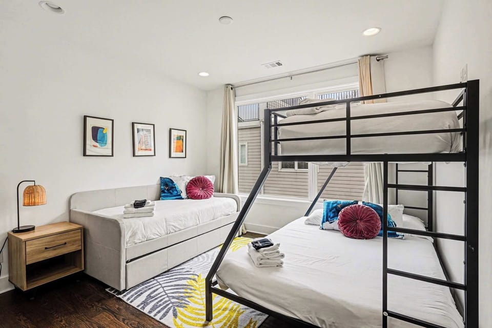 Bonus room w/ twin-over-queen bunk bed and a twin daybed w/ twin trundle | Unit A