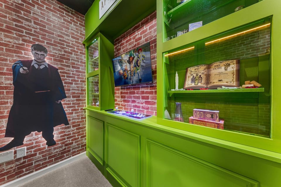 The magic continues with a bright 'apothecary' game nook-green display cabinets, TV, and whimsical props for hours of play.