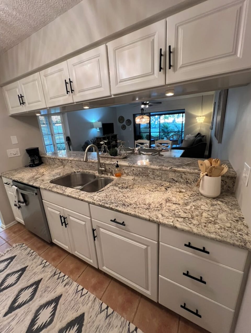 Granite countertops with brand new appliances.