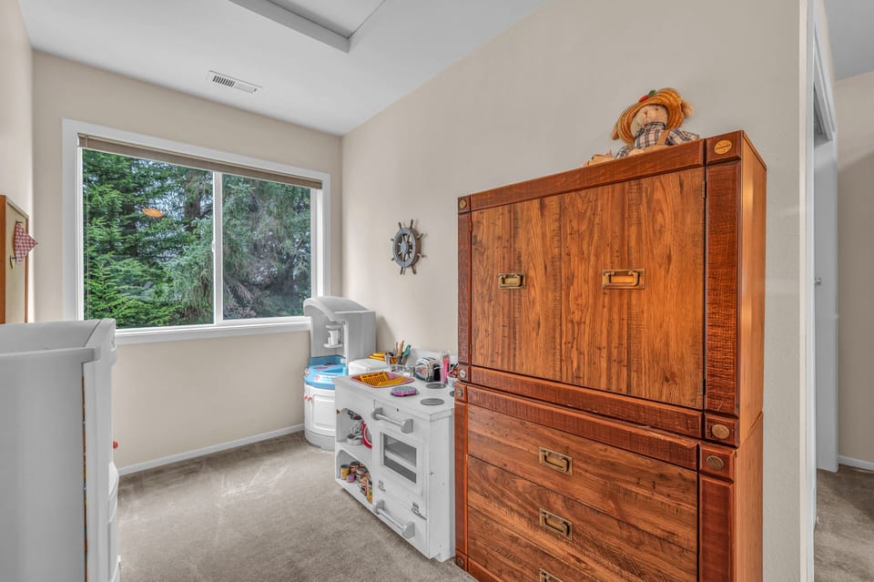 Your little ones will love their dedicated play space with charming toy kitchen and ample storage for all their treasures.