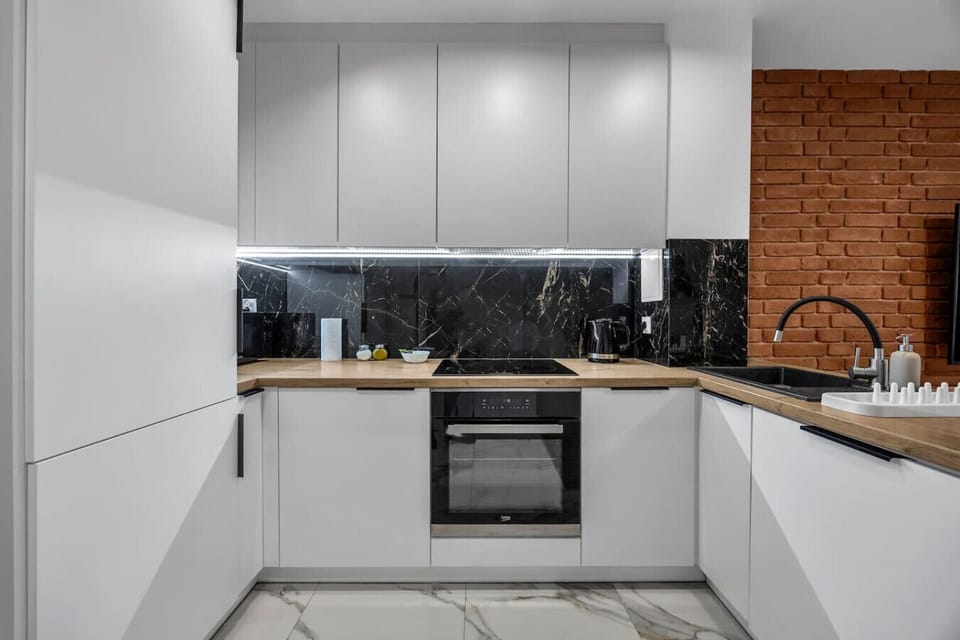 Muranów Studio - 10th Floor, Trams Nearby | Book Now with RENTUJEMY.COM