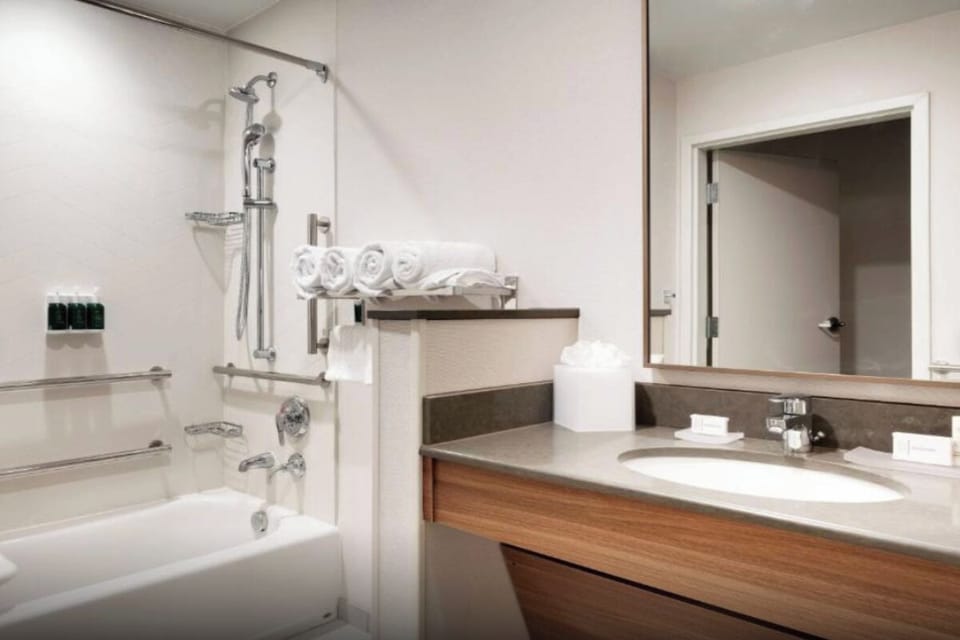 Refresh in a clean, bright bath with tub shower.