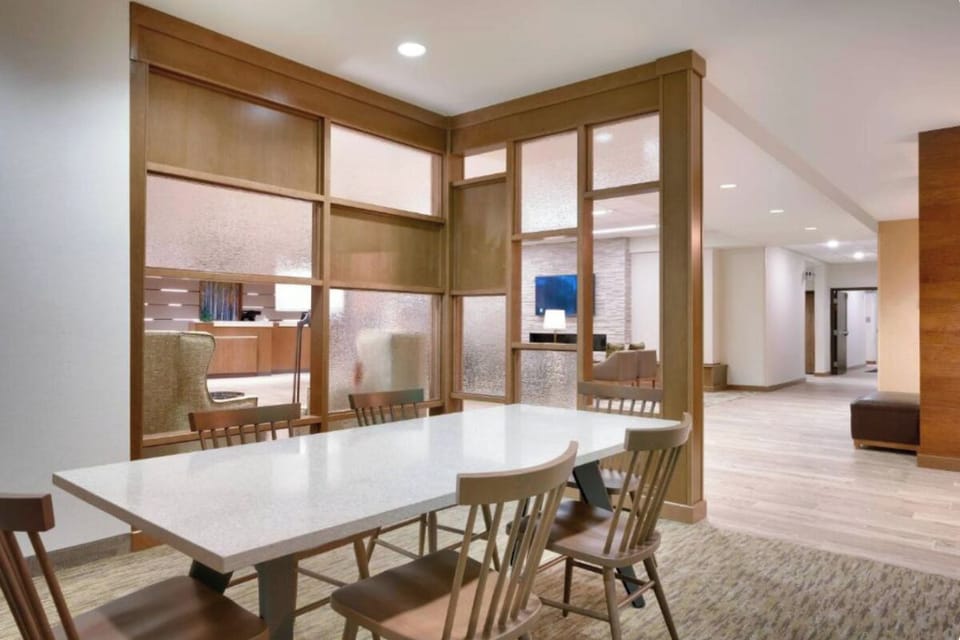 Plan your day together at a spacious table near the lobby.