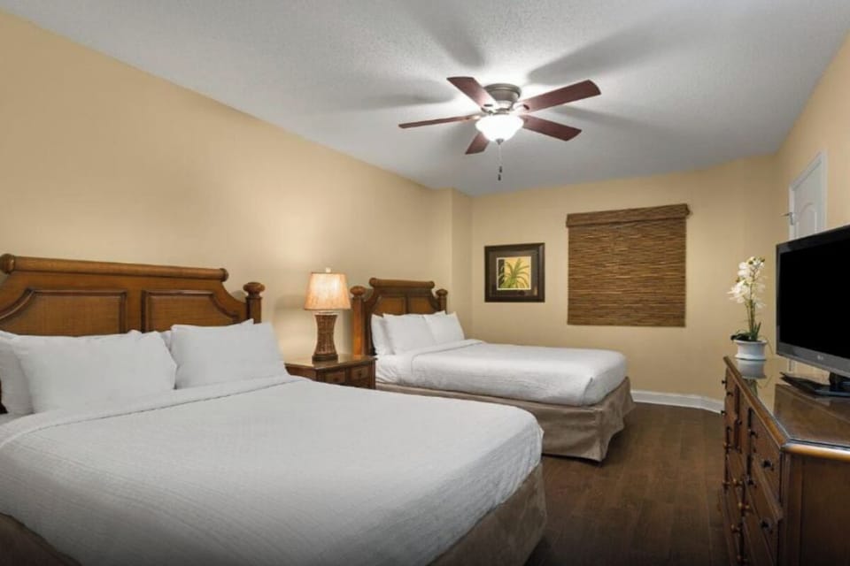 Unwind together in a spacious room with two cozy beds.