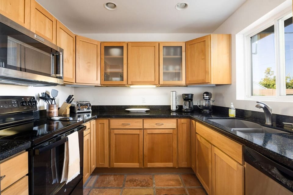 Our kitchen has plenty of counter space and everything you need for a home-cooked meal.