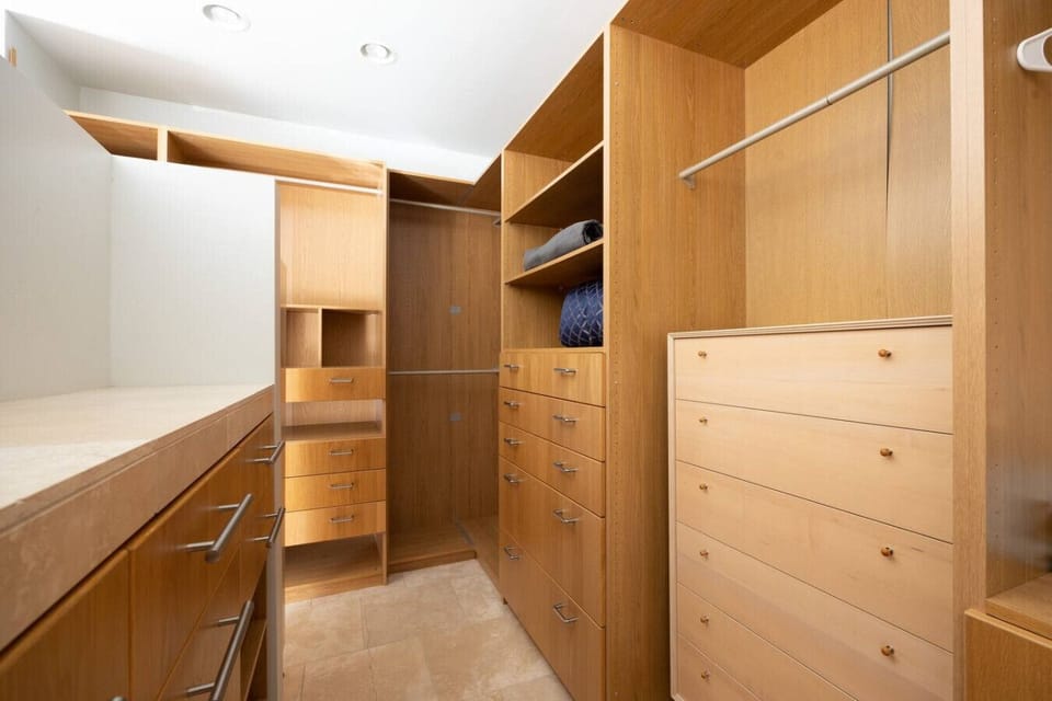 You’ll have plenty of built-in storage and hanging space in this massive walk-in closet.