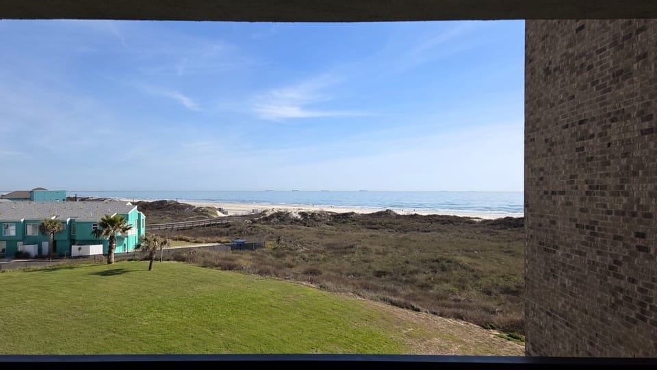 Enjoy gulf views from the primary bedroom, living room, and balcony