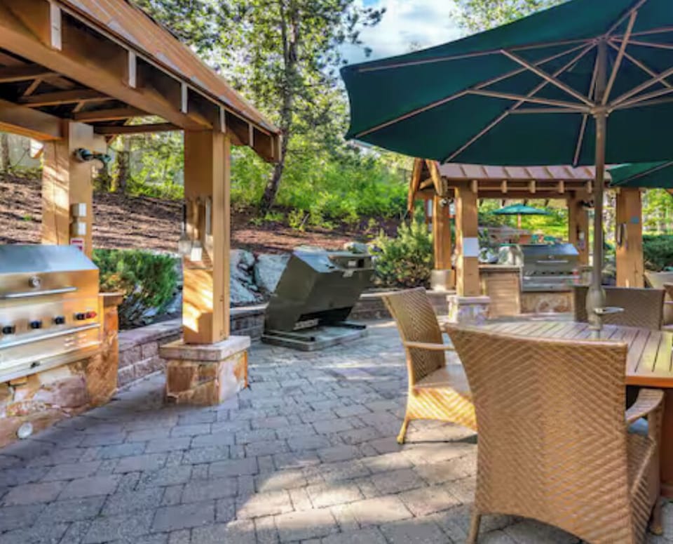 Pool side patio with barbecues