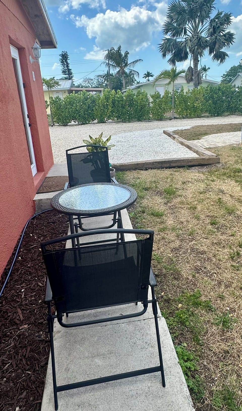 Patio table and chairs can also be moved to the front of the unit for sunshine