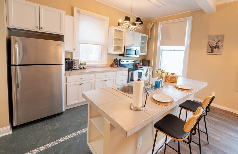 Stock up for your stay with a full-sized stainless steel refrigerator and ample cabinet storage for groceries.