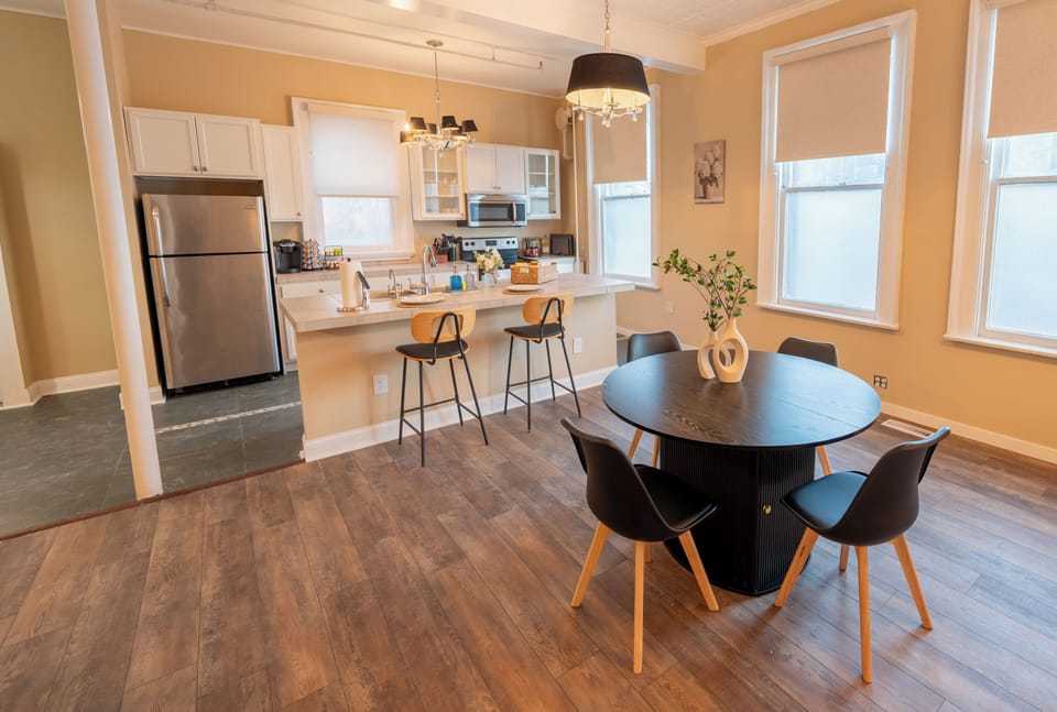 Gather for memorable meals in this sun-drenched, open-concept space designed for connection and laughter.