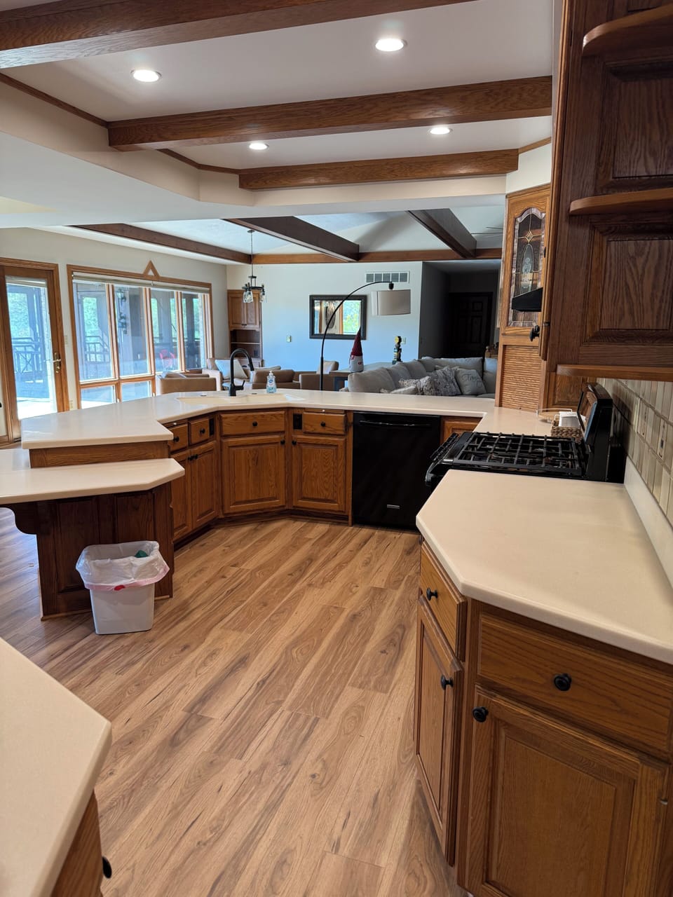 Fully stocked kitchen with fridge, dishwasher, stove, oven, and microwave. 