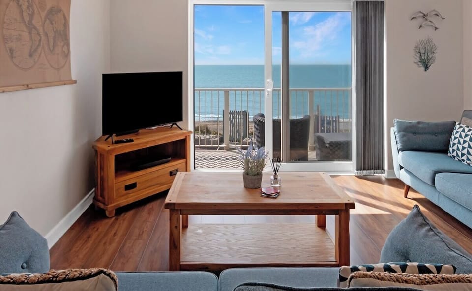 Relax in the cosy lounge while gazing out over Cardigan bay.