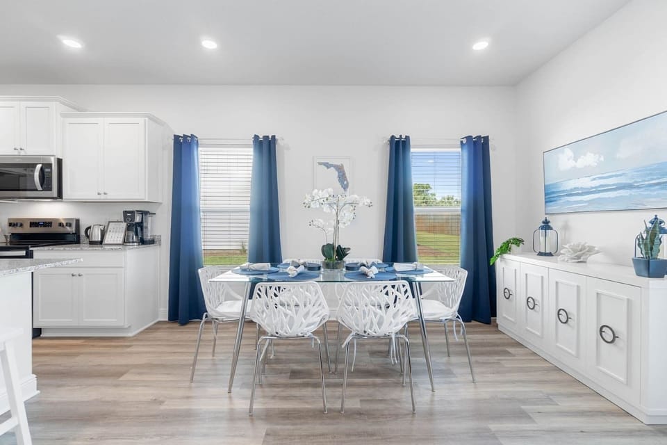 Enjoy elegant dining setting for 6 (additional seating is available at the island with 4 barstools). Enjoy extra placemats, table cloth, board games stored in the sideboard. 