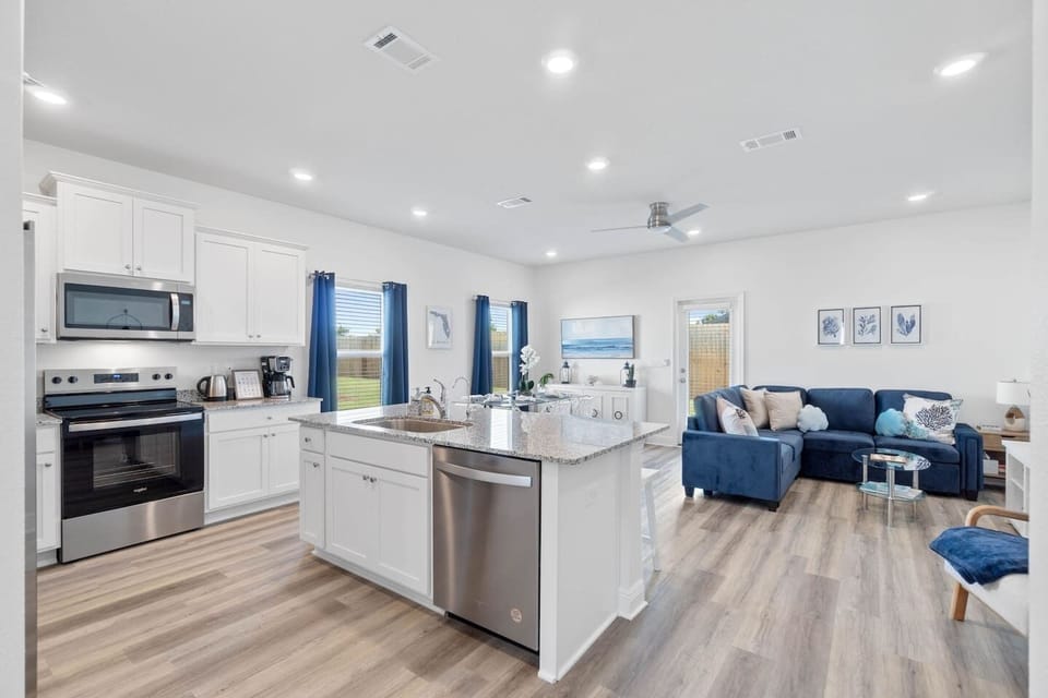 Fully Stocked Kitchen: range stove top with 4 burners, oven, microwave, dishwasher, garbage disposal, fridge with icemaker (cubed / crushed) and water. Everything you need to prep delicious meals in this spacious kitchen.