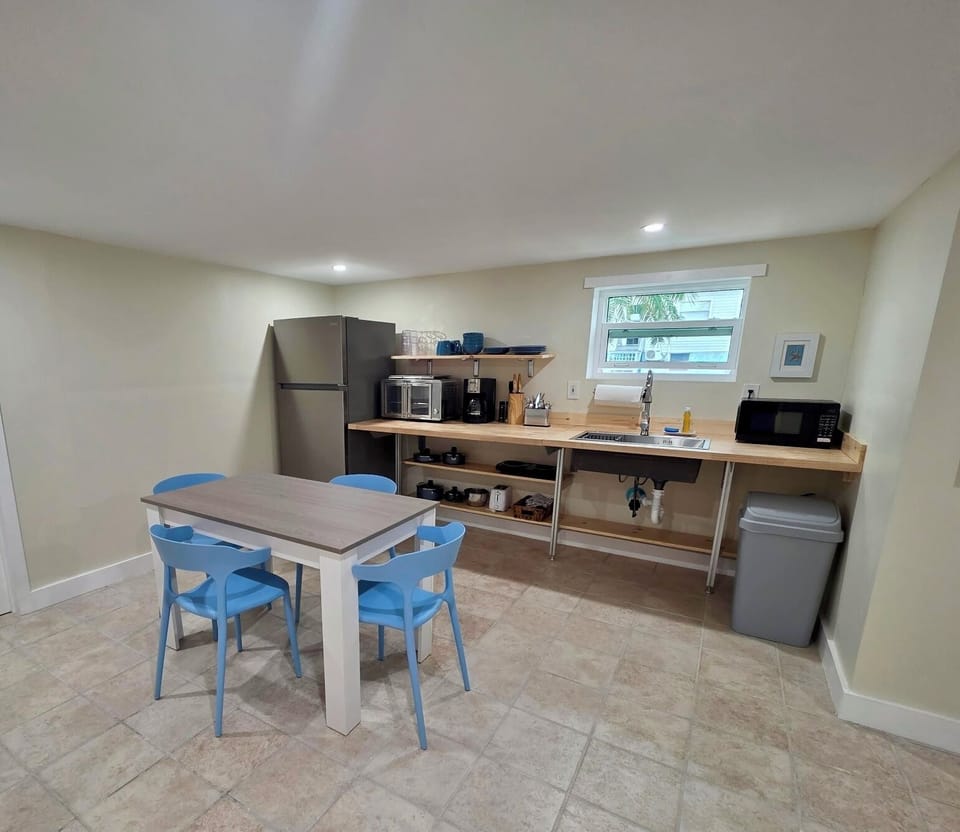 Open dining and kitchenette area makes vacation meals easy and convenient. 