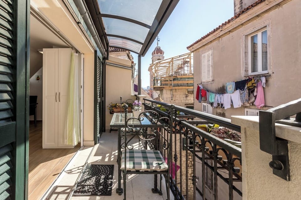 Balcony with sitting area.
