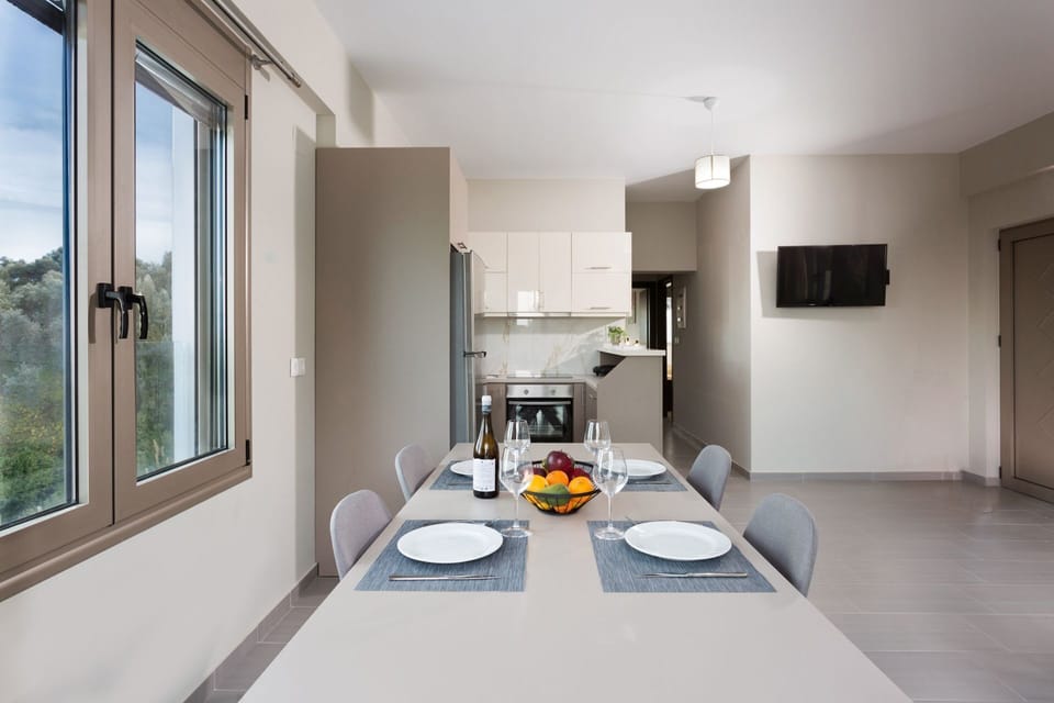 Spacious, open dining area and kitchen overlooking scenic views.
