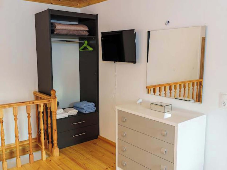 Wardrobe and TV in the bedroom for added comfort
