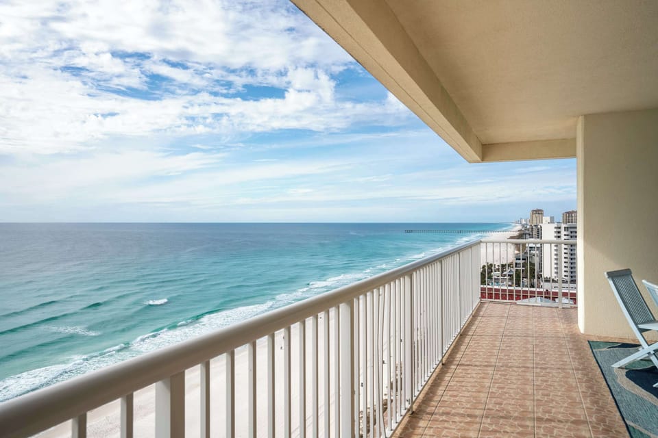 Gather on the balcony with ocean views and seating for eight