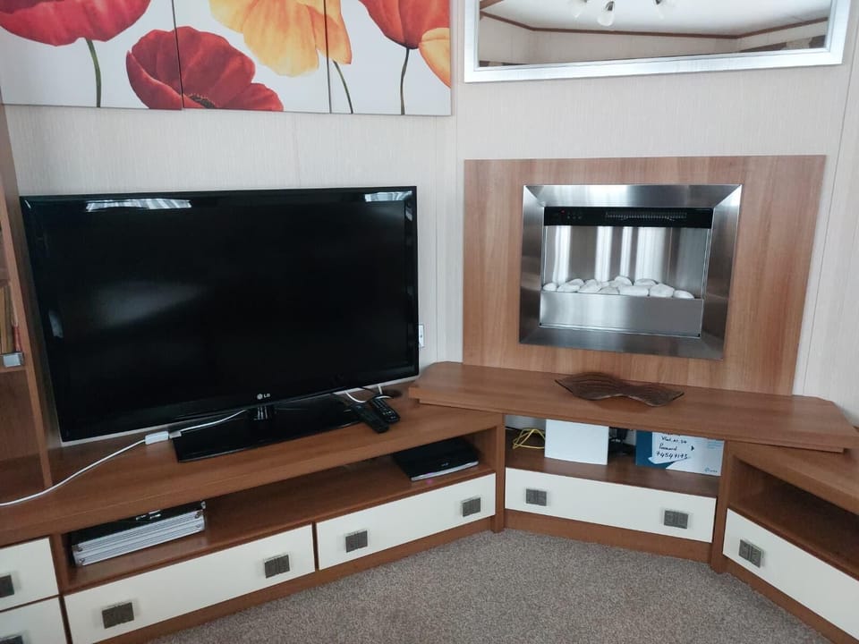 Perfect for those chilly nights the fire in the lounge will soon het up the caravan and make you feel snug. Book your summer break today for 2026 and secure it for a low deposit of just £25.