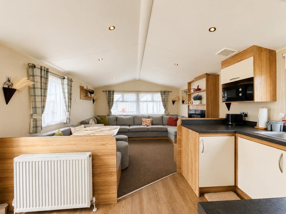 In this open plan kitchen you can prepare dinner whilst still being involved in conversation. Its the perfect place for a relaxing break for the whole family.