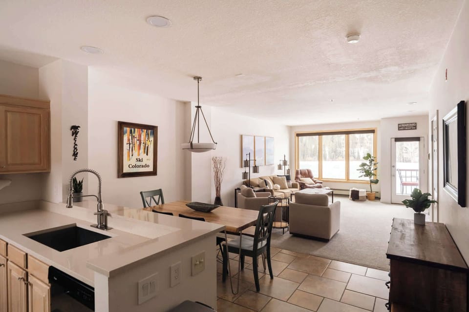 Kitchen, dining, and living areas