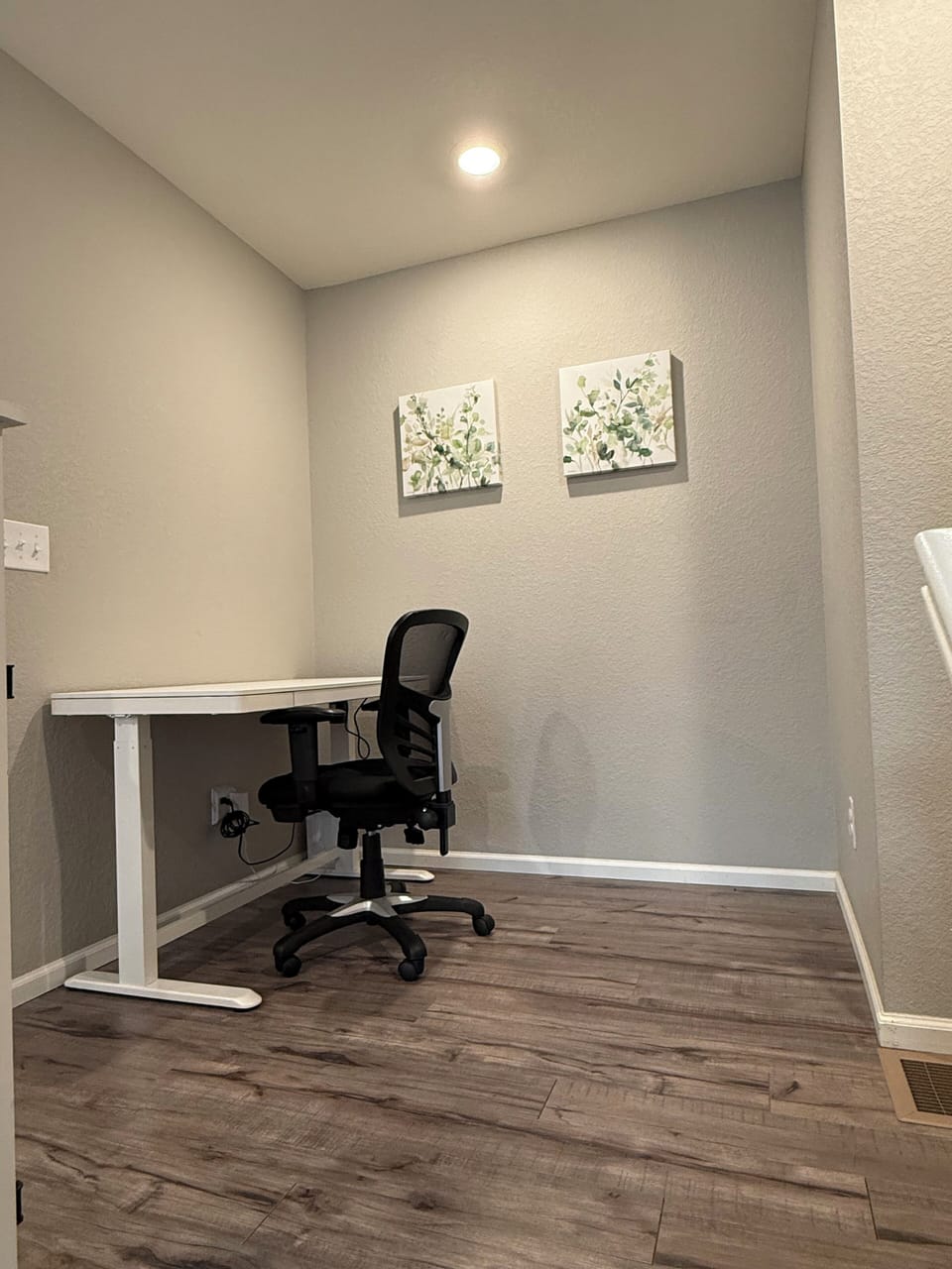 Office area, located in the upstairs loft. Electric desk for standing or sitting